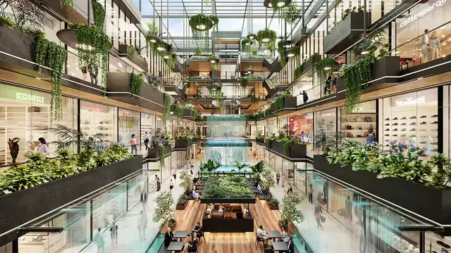 Elan Paradise open-to-sky atrium with water body and hanging plants