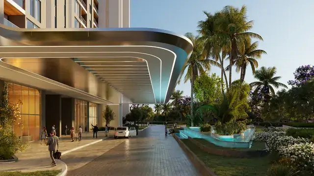 Curved drop-off canopy and landscaped walkway at Elan The Presidential